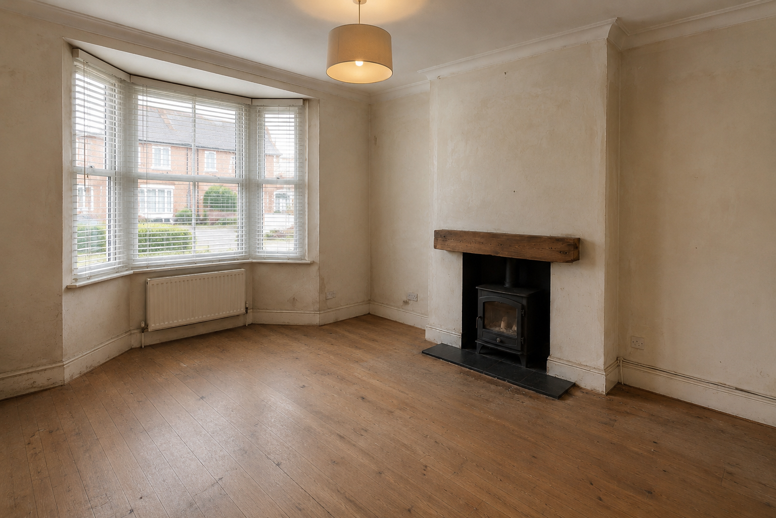 Living room with fireplace before